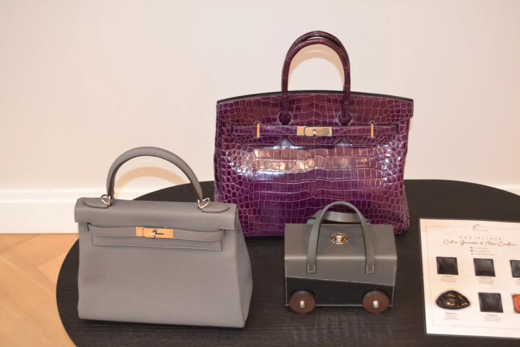 Saclab Hermès Birkin 35 Niloticus Krokodilleder Amethyst, Hermès Kelly 28 Togo Gris ÉtainHermès Petit H Minaudière Auto Alligator Mississippi